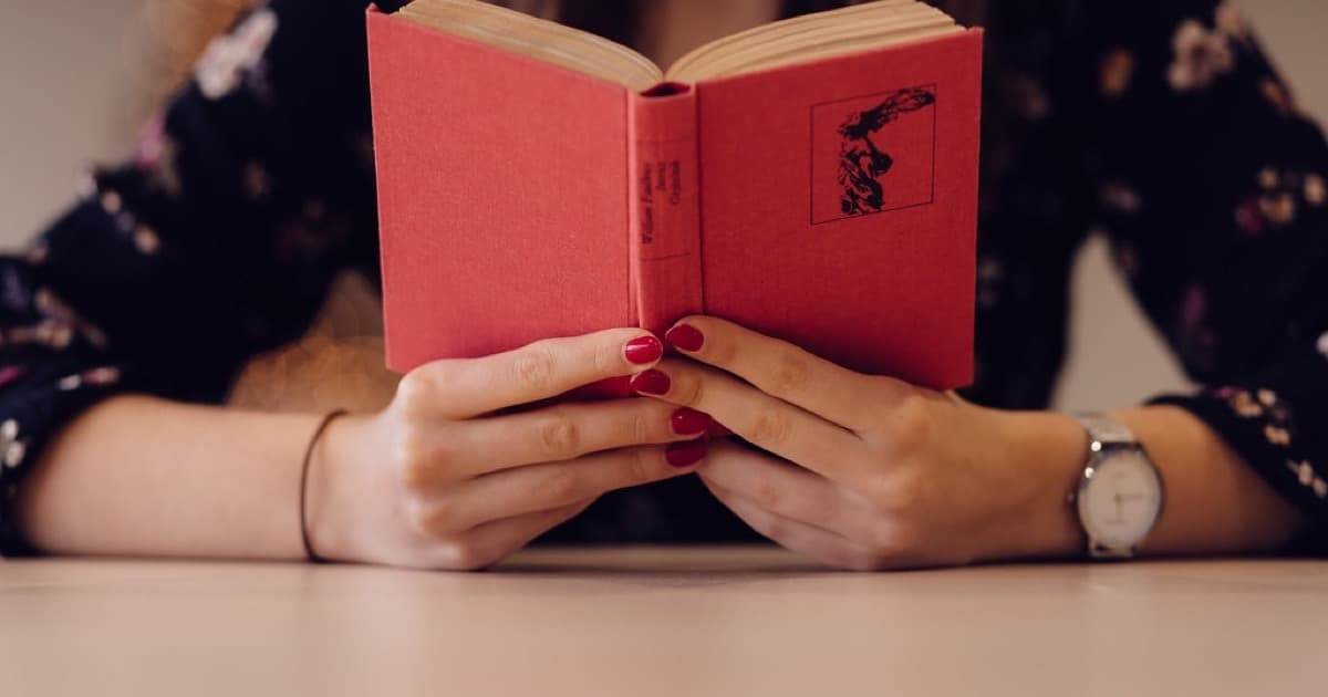 Girl reading a book, featured image for Technical SEO foundations before GEO for education and institutions